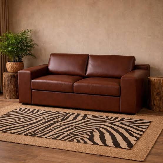 Hand-stitched leather sleeper couch with reinforced hardwood base