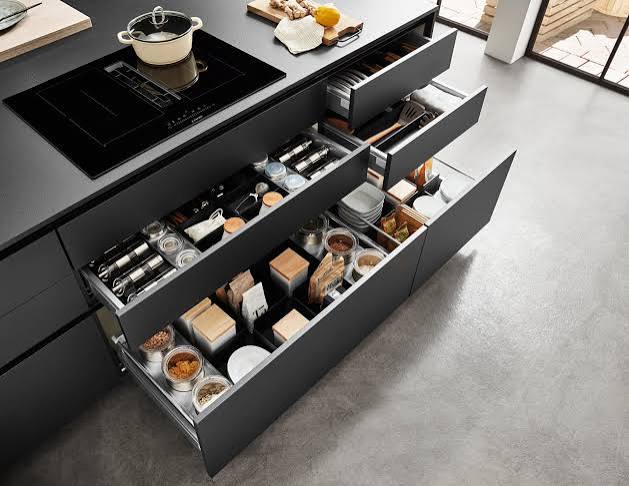 Kitchen island with deep pull-out soft-close storage drawers and built-in dividers