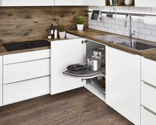Modern kitchen corner cabinet with smooth pull-out carousel shelves
