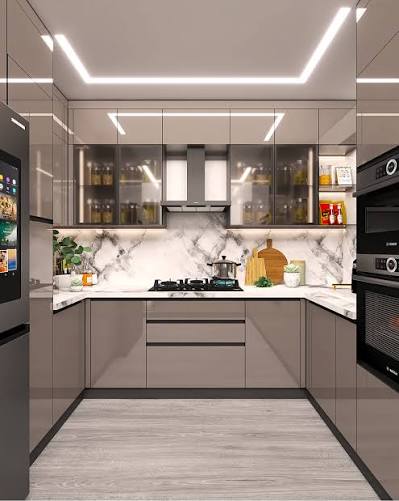 Spacious U-shaped kitchen layout with wrap-around cabinetry and prep zones